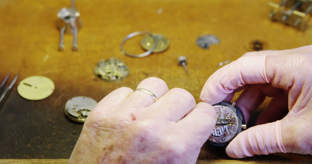 Watchmaker Repairing Mechanical Watch Movement in Workshop - Free Images, Stock Photos and Pictures on Pikwizard.com