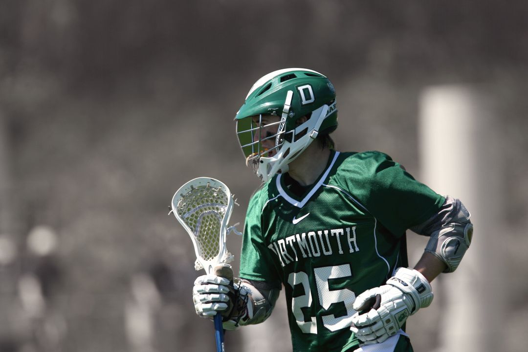 Lacrosse Player in Green Uniform Running During Game - Free Images, Stock Photos and Pictures on Pikwizard.com