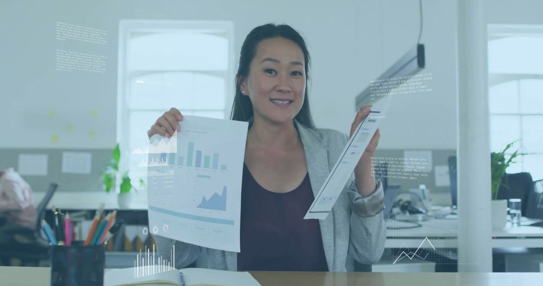 Businesswoman Analyzing Charts with Digital Data Interface
