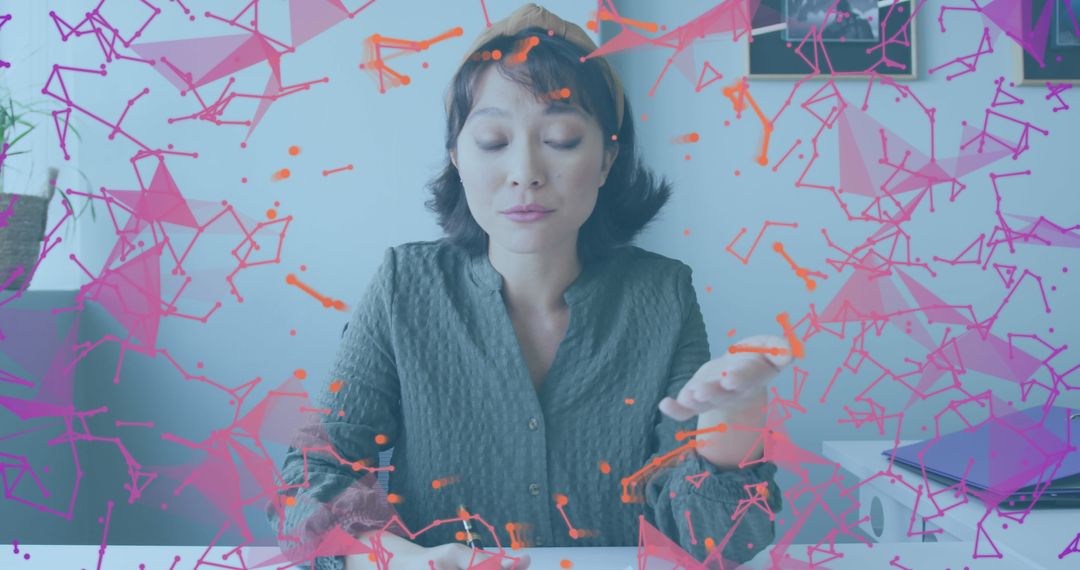 Asian Woman in Office Surrounded by Plexus Networks Graphics