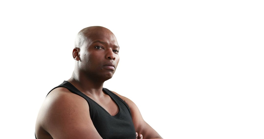 Confident African American Man Posing in Tank Top - Free Images, Stock Photos and Pictures on Pikwizard.com