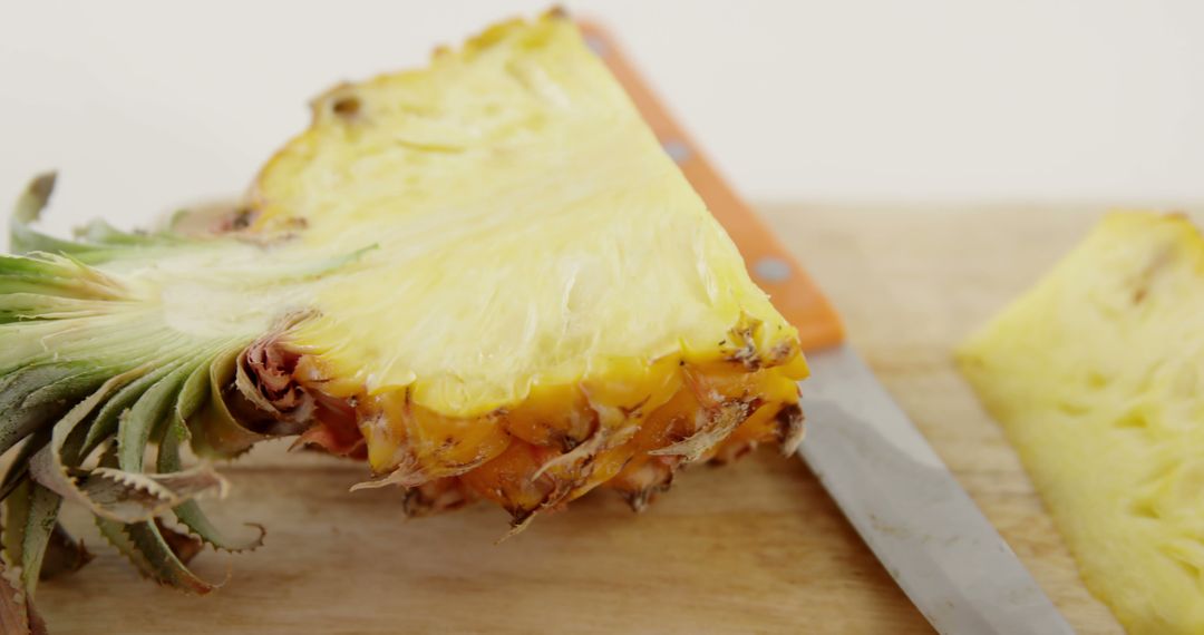 Closeup of Fresh Pineapple Slice on Wooden Cutting Board - Free Images, Stock Photos and Pictures on Pikwizard.com