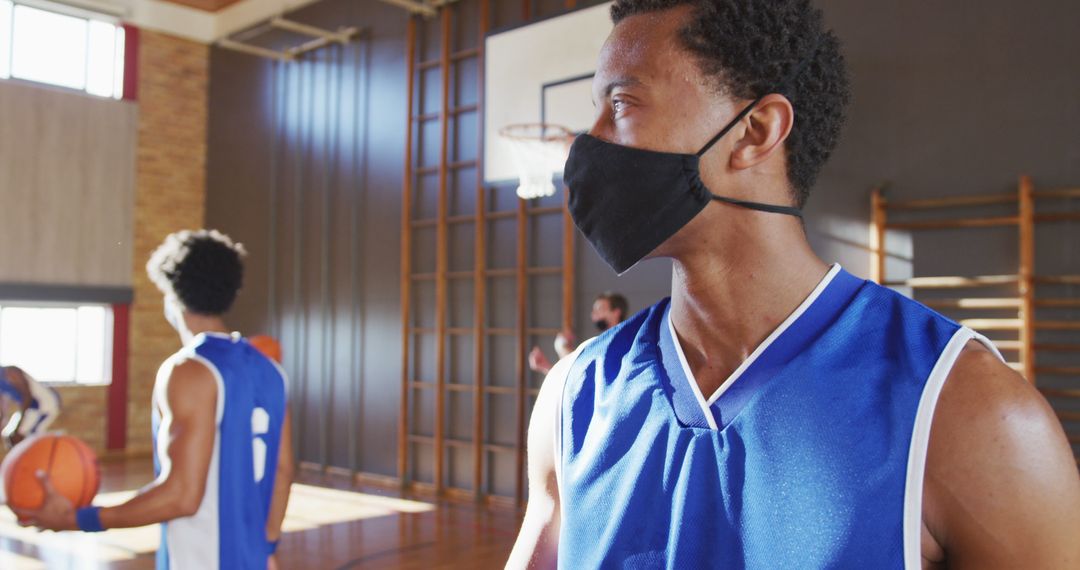 Masked Basketball Player Preparing During COVID-19