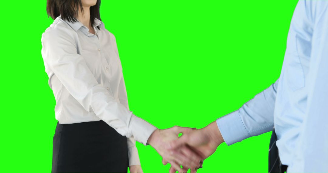 Businesspeople Handshaking Against Green Screen for Chroma Key Use - Free Images, Stock Photos and Pictures on Pikwizard.com