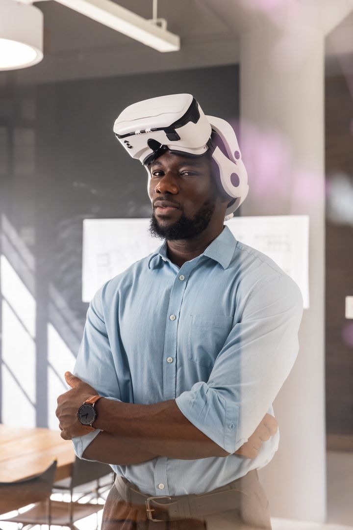 Confident Professional Using VR Headset in Modern Office Setting