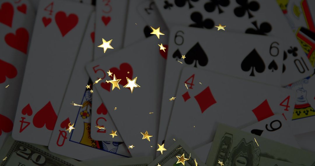 Glowing Stars Overlaying Playing Cards and Cash