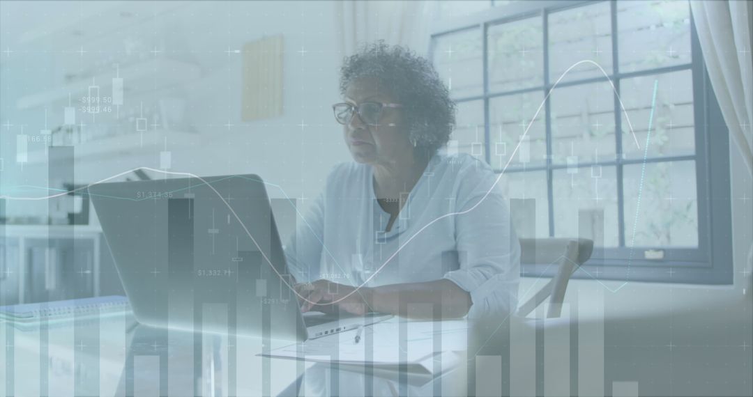 Senior Woman Managing Finances Online with Data Graphics