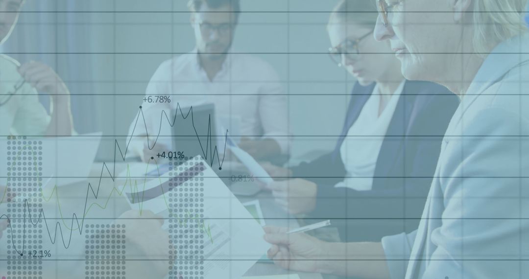 Business Professionals Analyzing Data with Graph Overlay in Boardroom