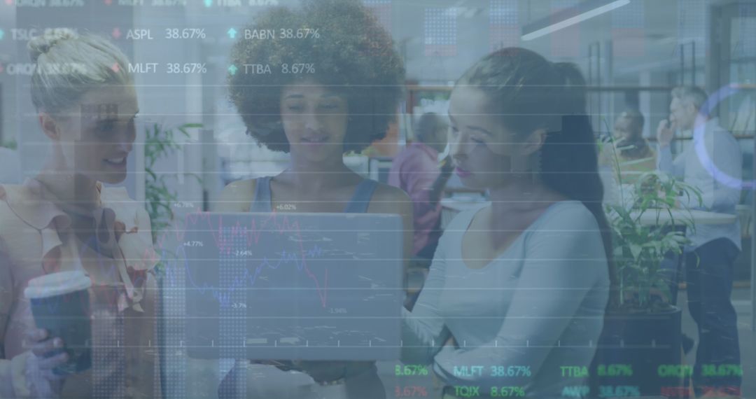 Diverse Female Team Collaborating Over Financial Analysis