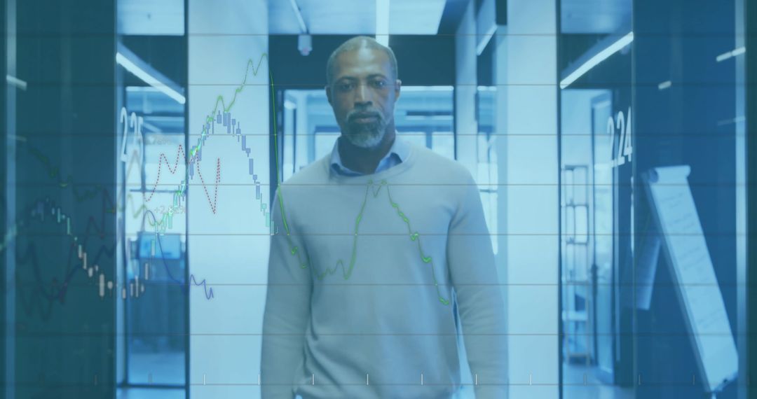 Confident Businessman Analyzing Financial Data on Virtual Interface