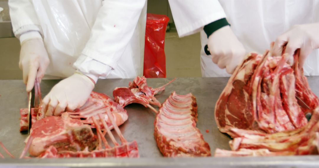 Butchers Slicing Raw Meat - Free Images, Stock Photos and Pictures on Pikwizard.com