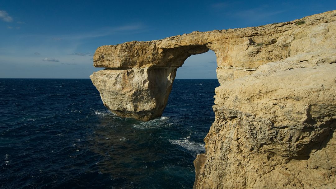 Azure Window Natural Limestone Rock Arch over Mediterranean Sea - Free Images, Stock Photos and Pictures on Pikwizard.com