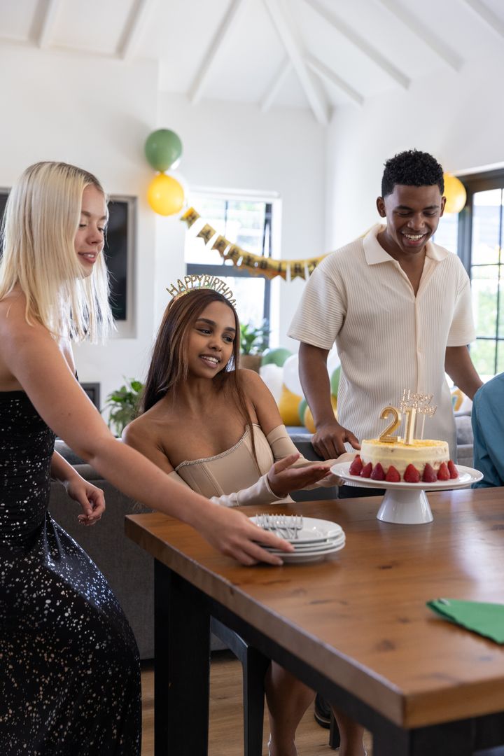 Diverse Group Celebrating Birthday with Cake and Joy