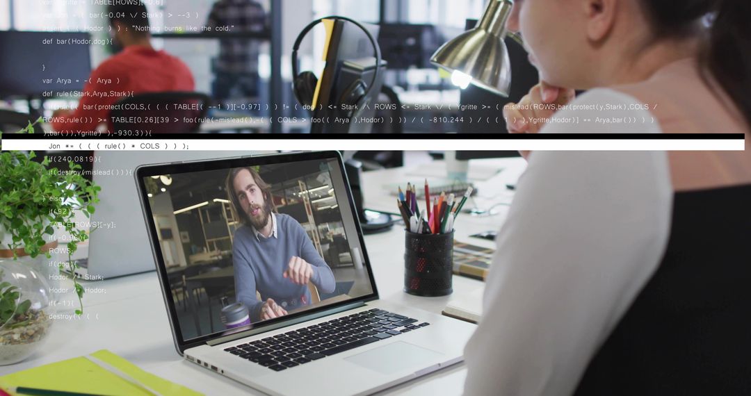 Professional Engaged in a Remote Video Conference in Modern Office Space