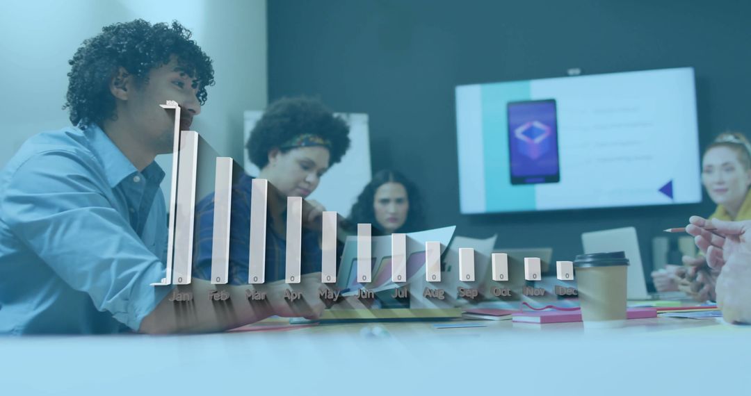 Diverse Team Collaborating on Creative Project in Modern Meeting Room