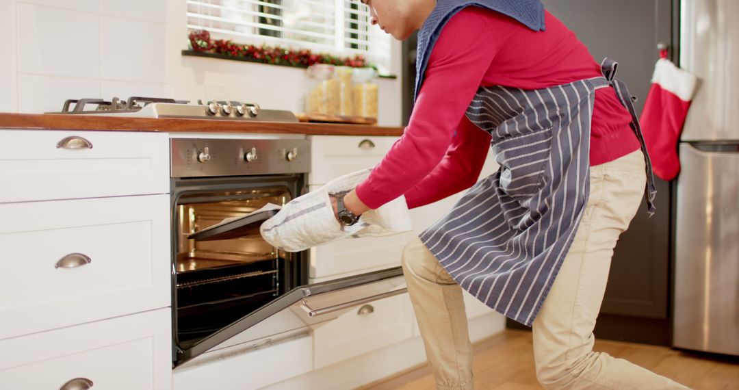 Man Baking in Modern Kitchen During Holiday Season - Free Images, Stock Photos and Pictures on Pikwizard.com