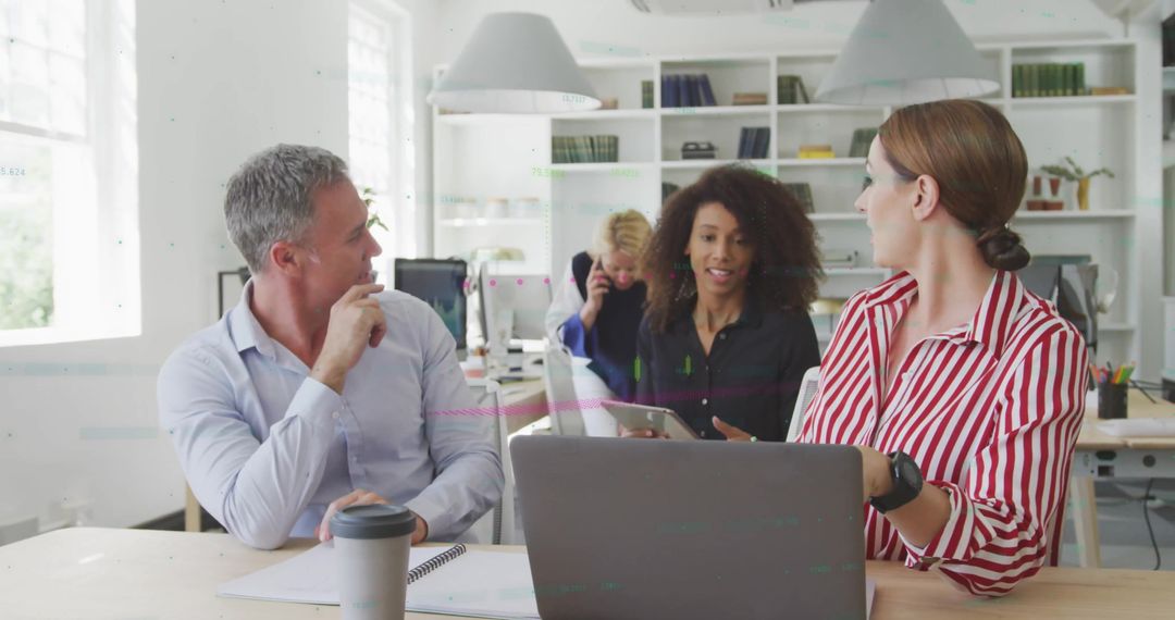 Interracial Business Team Collaborating on Financial Project