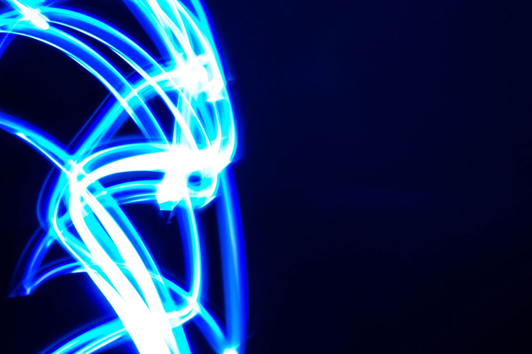 Abstract Electric Blue Light Trails on Dark Background - Free Images, Stock Photos and Pictures on Pikwizard.com