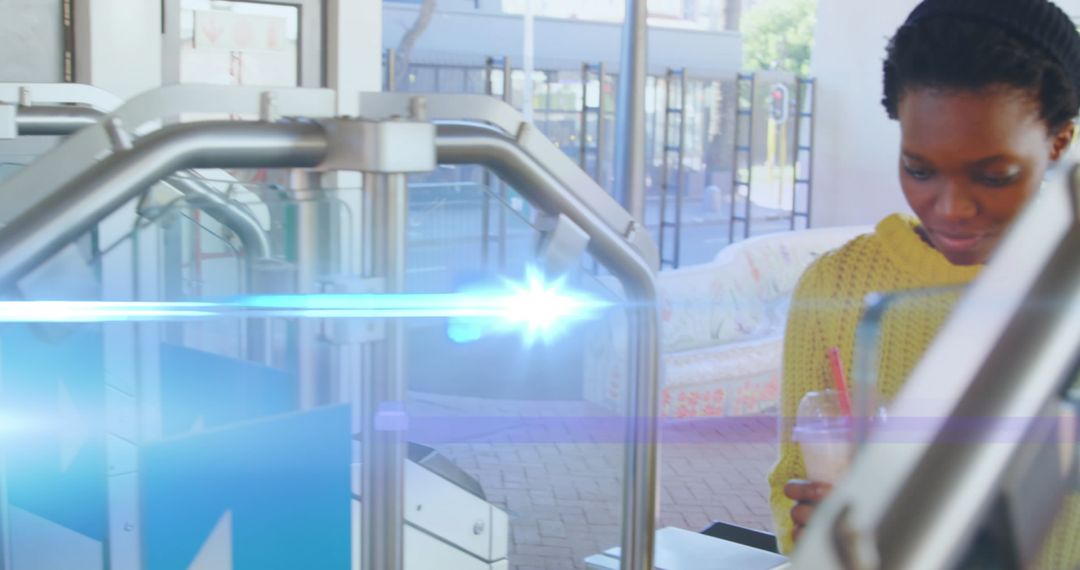 African American Woman at Train Station Barrier, Positivity in Public Spaces