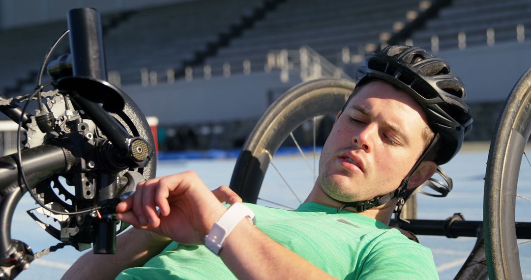 Athlete Resting After Handcycle Training on Outdoor Track - Free Images, Stock Photos and Pictures on Pikwizard.com