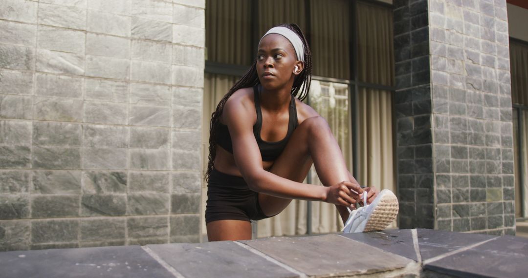 African American Woman Stretching Before Outdoor Workout - Free Images, Stock Photos and Pictures on Pikwizard.com