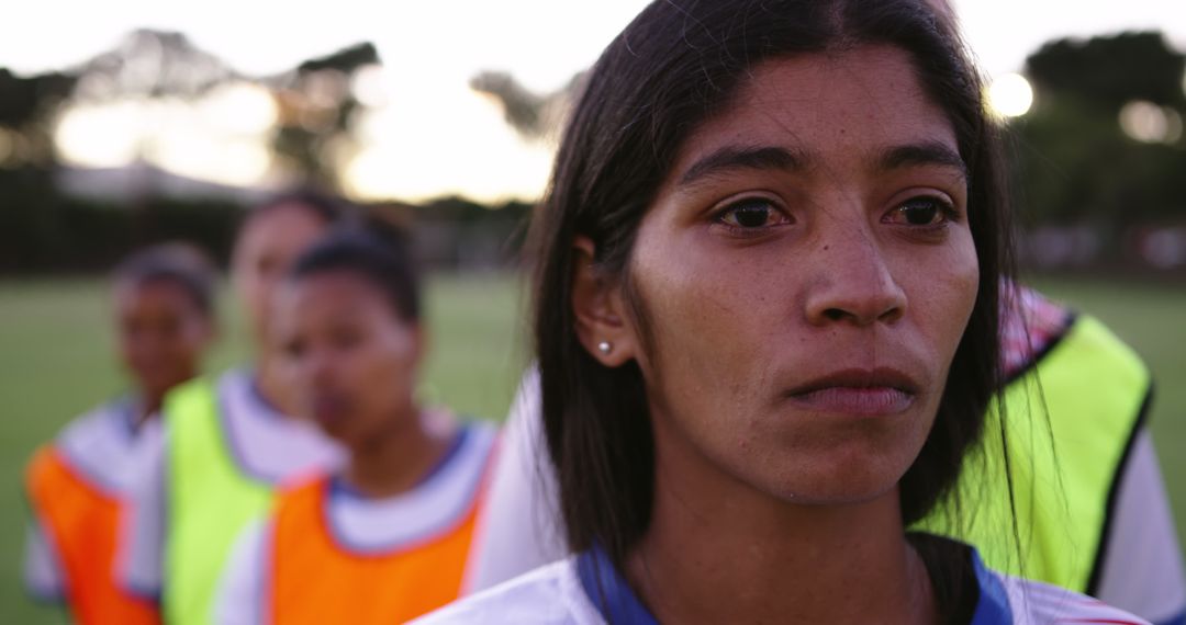 Female Soccer Player Standing Focused Before Game at Sunset - Free Images, Stock Photos and Pictures on Pikwizard.com