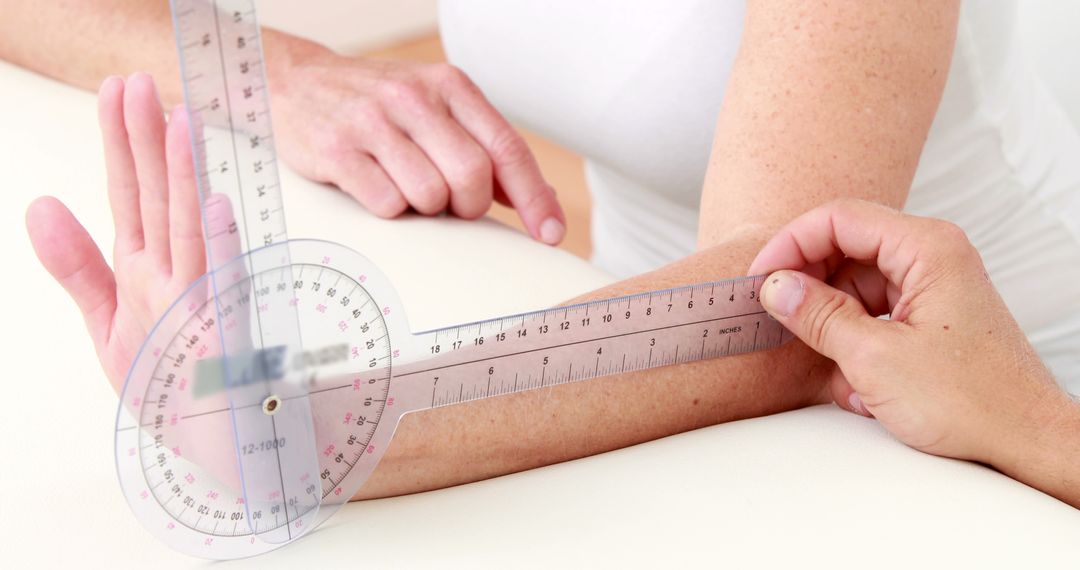 Physical Therapist Measuring Patient's Range of Motion with Goniometer - Free Images, Stock Photos and Pictures on Pikwizard.com