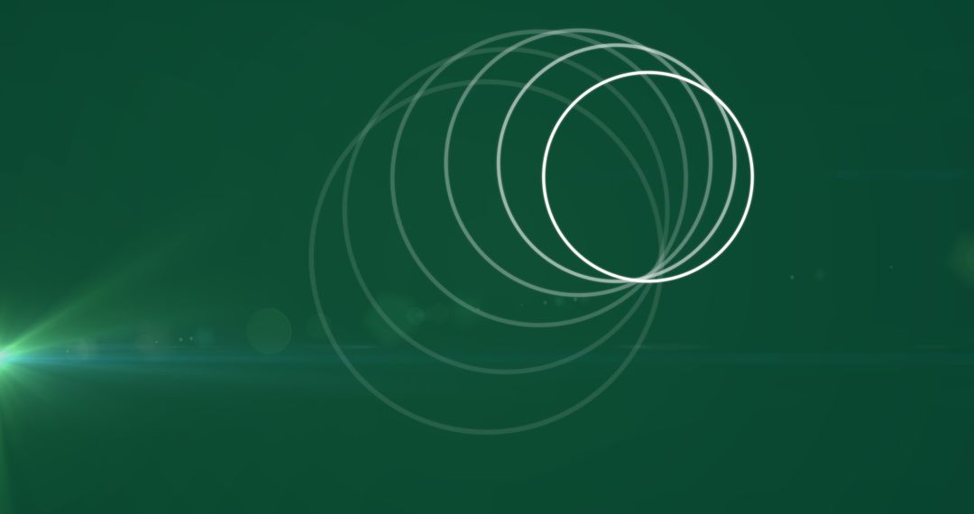 Glowing Circles and Lens Flares on Green Background
