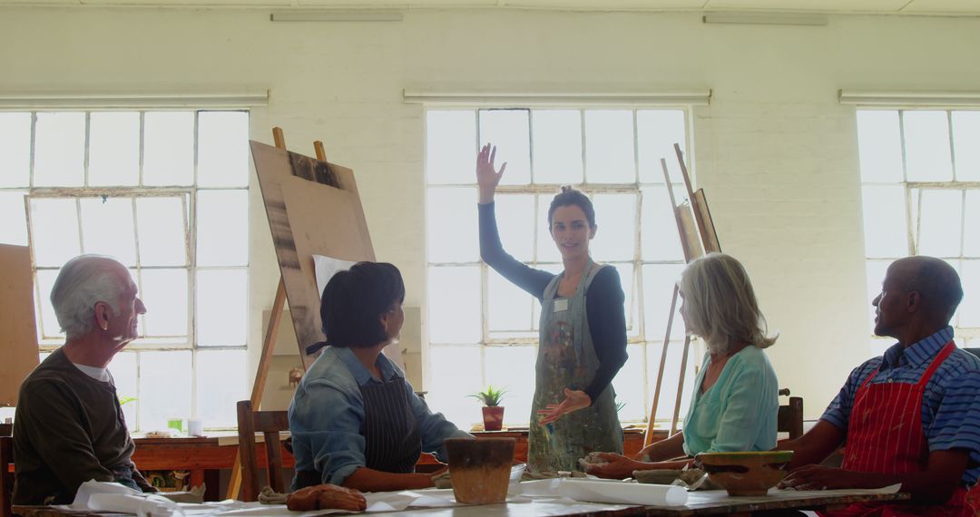 Art Instructor Teaching a Diverse Group of Adult Students - Free Images, Stock Photos and Pictures on Pikwizard.com