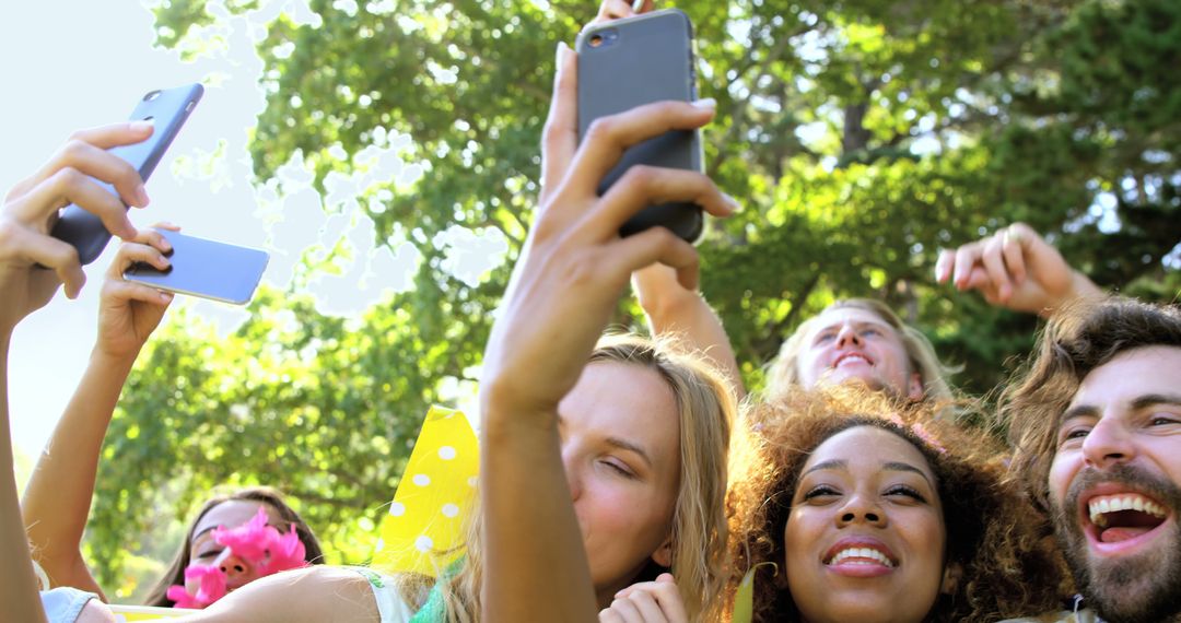 Friends Taking Selfies at Outdoor Picnic - Free Images, Stock Photos and Pictures on Pikwizard.com