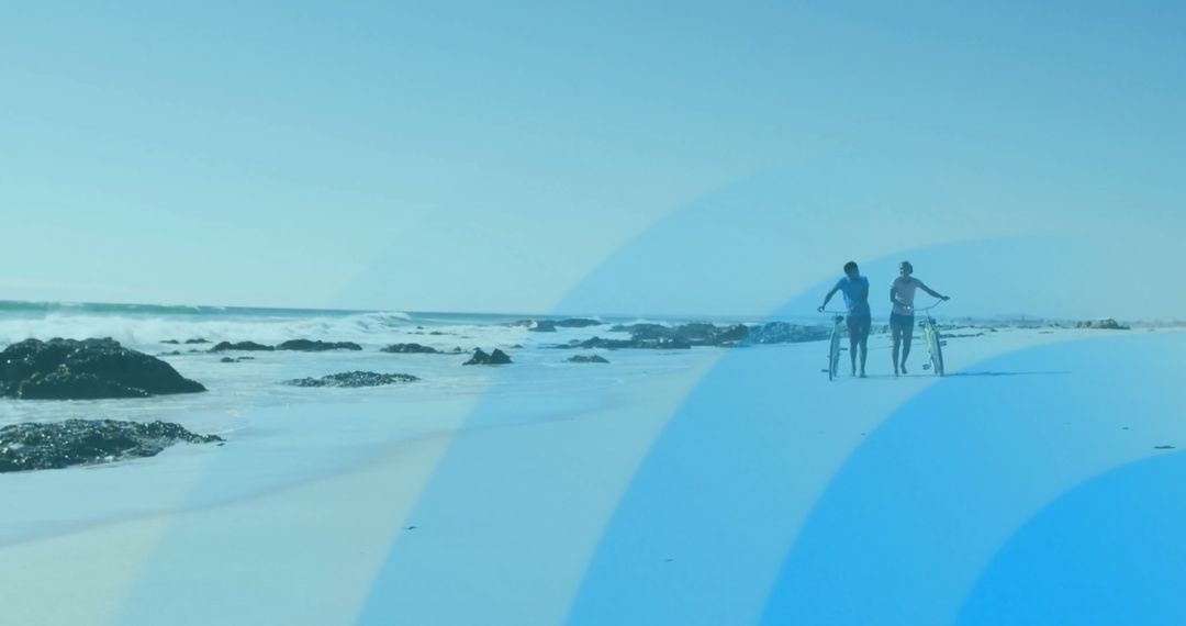 Couple Enjoying Leisurely Beach Walk with Bicycles