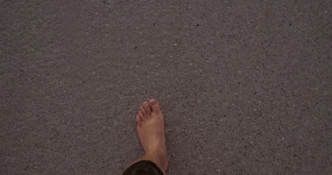 Barefoot Person Walking on Sandy Beach - Free Images, Stock Photos and Pictures on Pikwizard.com