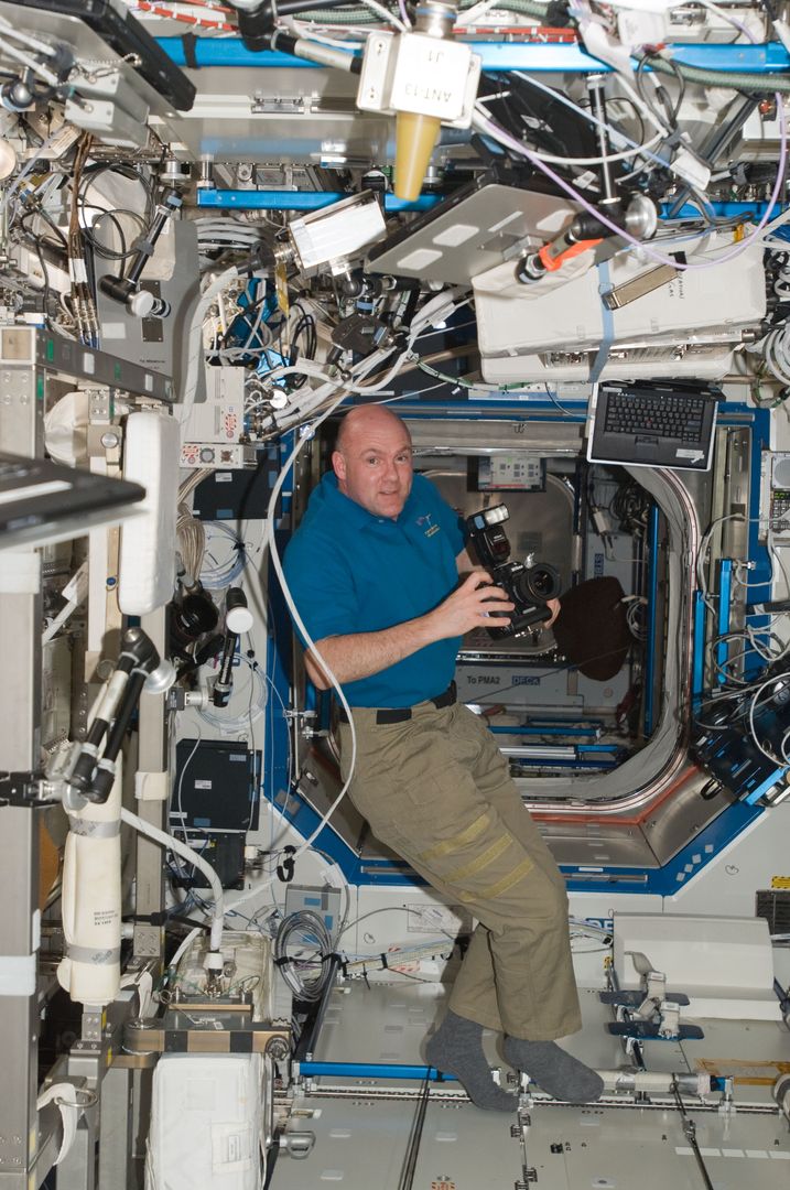 Astronaut Documenting Space Life in ISS Harmony Module