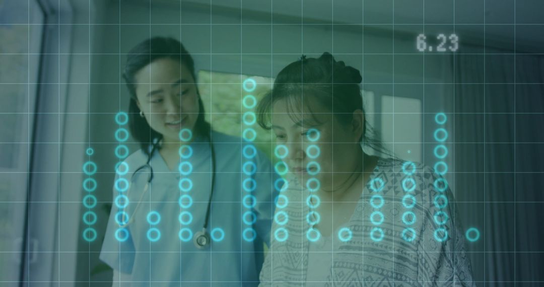 Healthcare Professional Using Digital Monitoring Technology with Patient