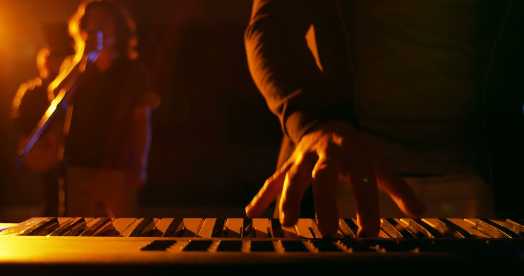 Live Band Performance with Keyboard and Singer in Warm Stage Lights