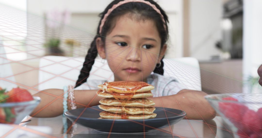 Pensive child staring at stack of pancakes with maple syrup, family breakfast hesitation