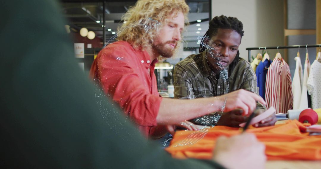 Fashion Designers Collaborating with Textile and Fabric Samples