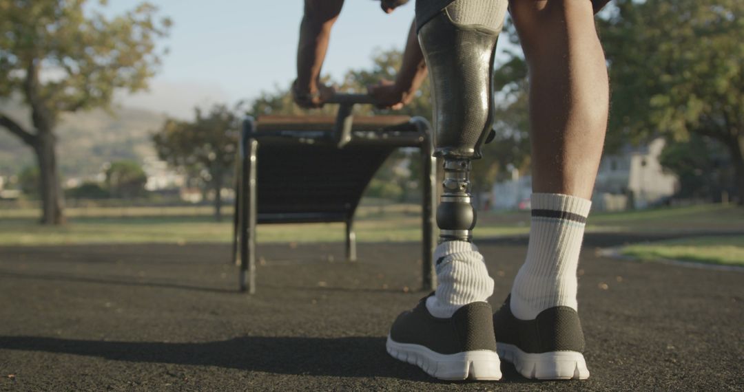 Person With Prosthetic Leg Exercising in Outdoor Park - Free Images, Stock Photos and Pictures on Pikwizard.com