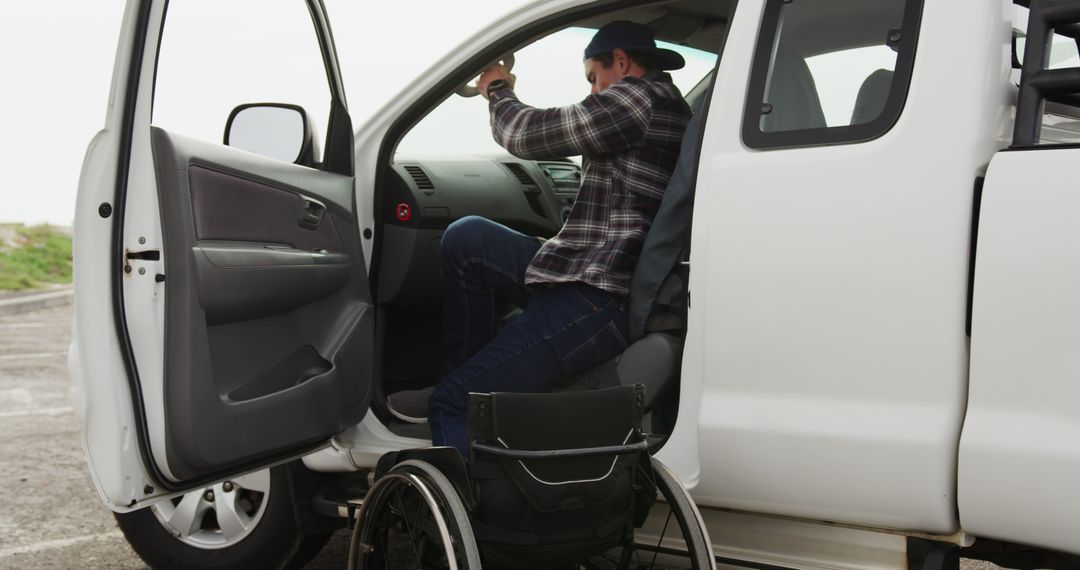 Man Transferring from Wheelchair to Car - Free Images, Stock Photos and Pictures on Pikwizard.com