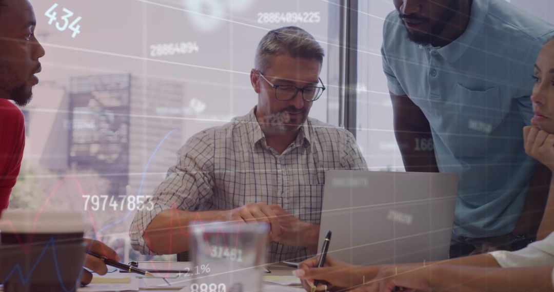 Business Team Analyzing Financial Data in Modern Office Meeting