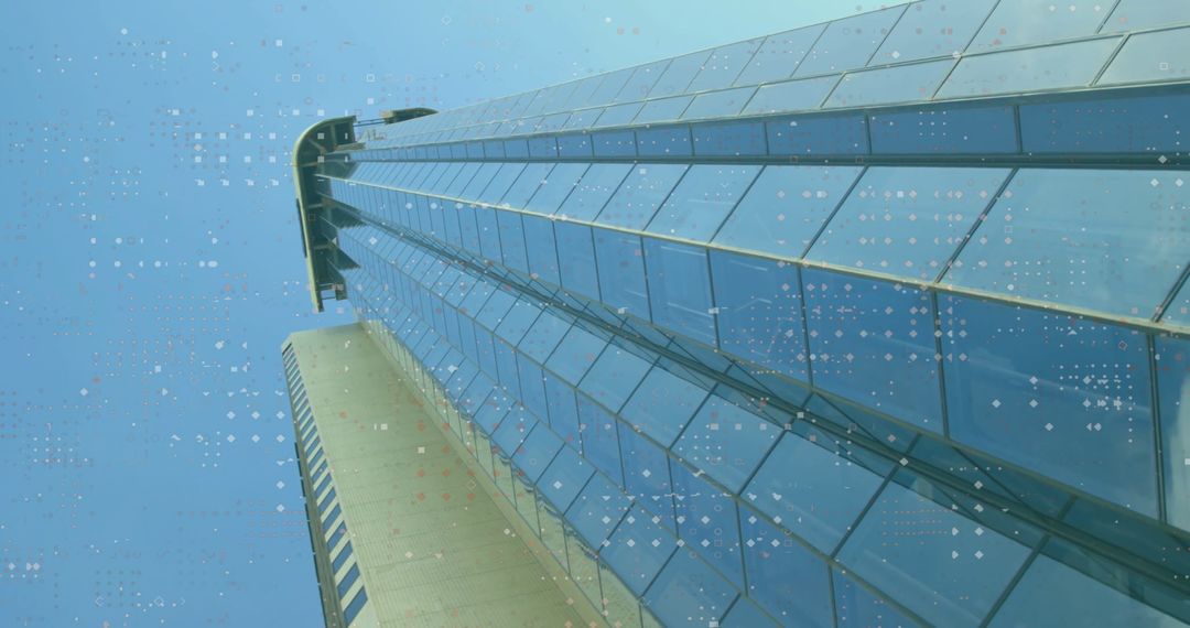 Skyscraper with Glass Panels Reaching Tower High in Cityscape