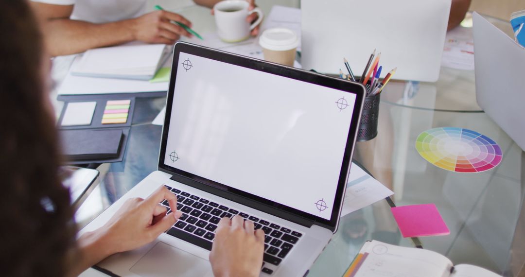 Female Professional Working on Laptop with Blank Screen Mockup