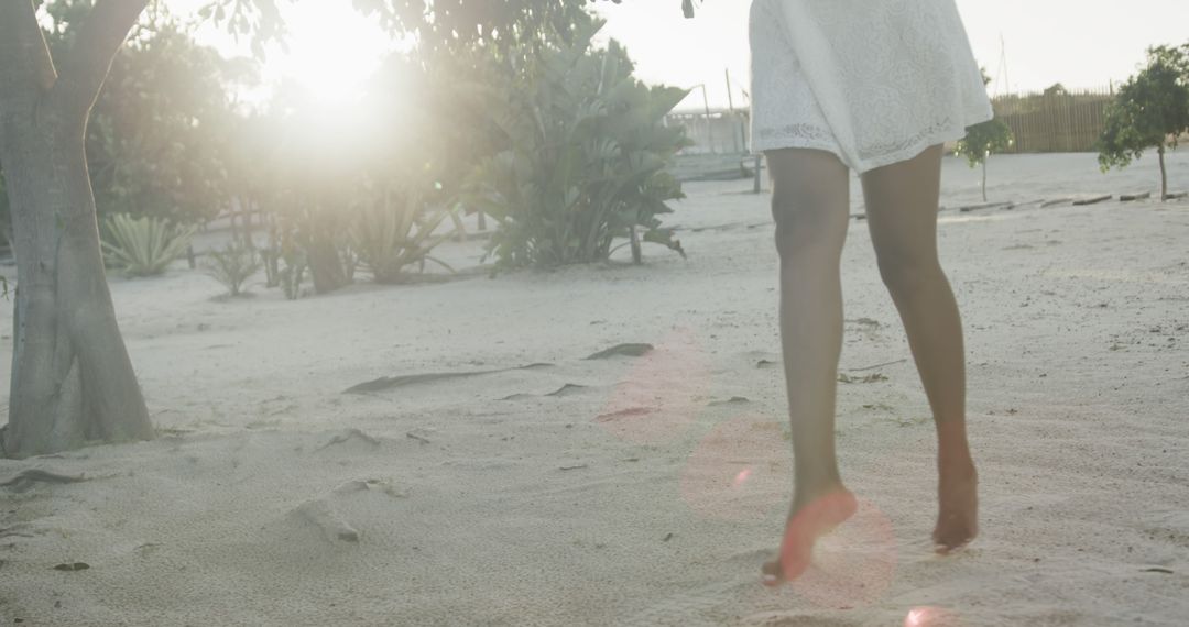 Woman Barefoot in Desert Sunlight with Lace Dress - Free Images, Stock Photos and Pictures on Pikwizard.com