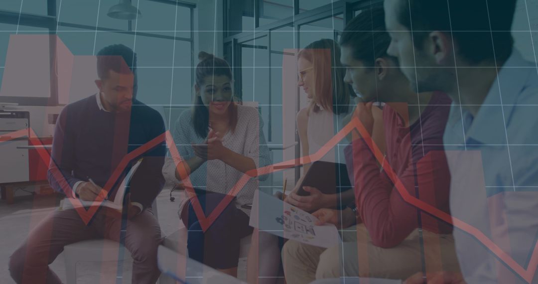 Diverse team collaborating over data visualization with smartphone in office teamwork