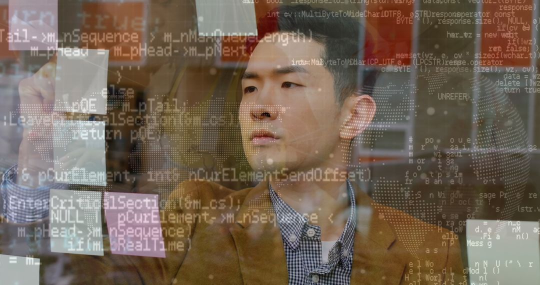 Young Asian Professional Analyzing Digital Data