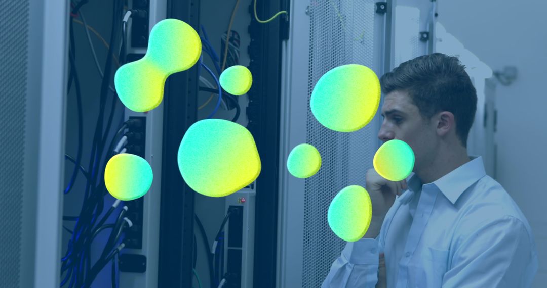 Server Technician Analyzing Equipment in High-Tech Factory