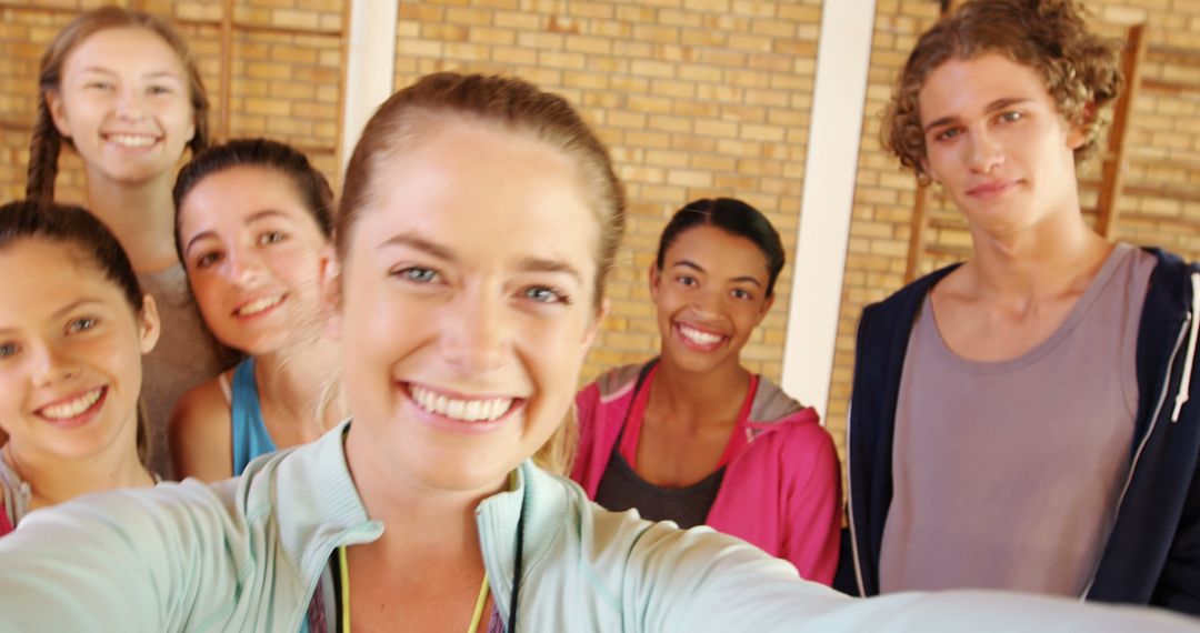 Group of Friends Taking Selfie in Gym with Smiling Faces - Free Images, Stock Photos and Pictures on Pikwizard.com