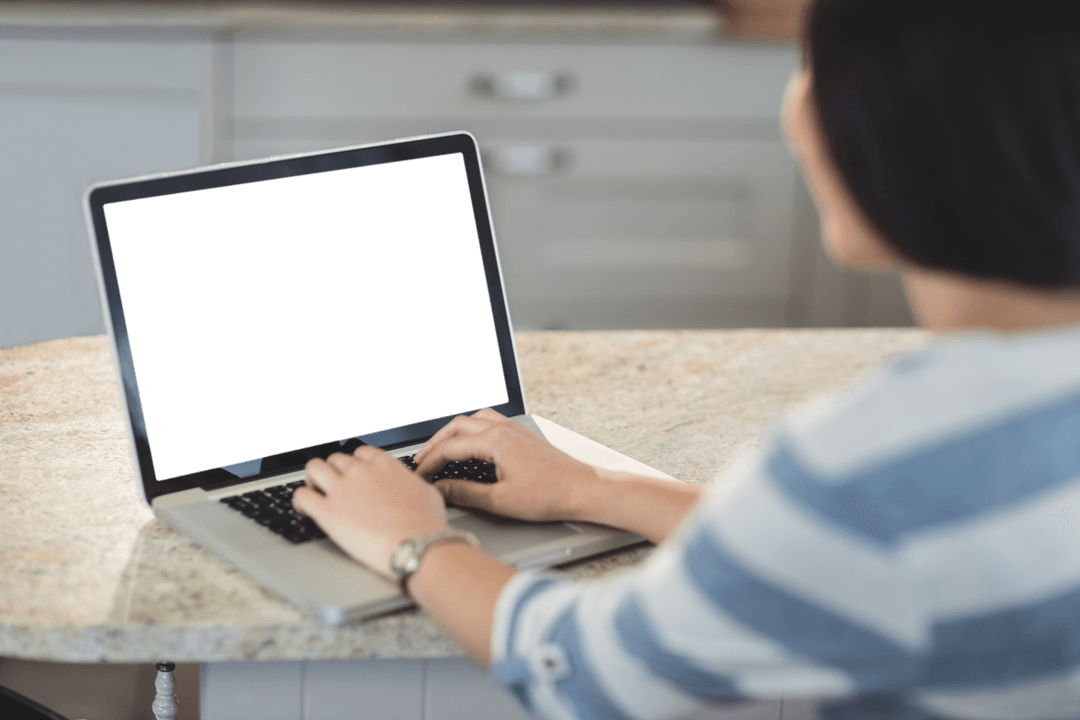 Transparent Device Screen with Woman Typing at Home