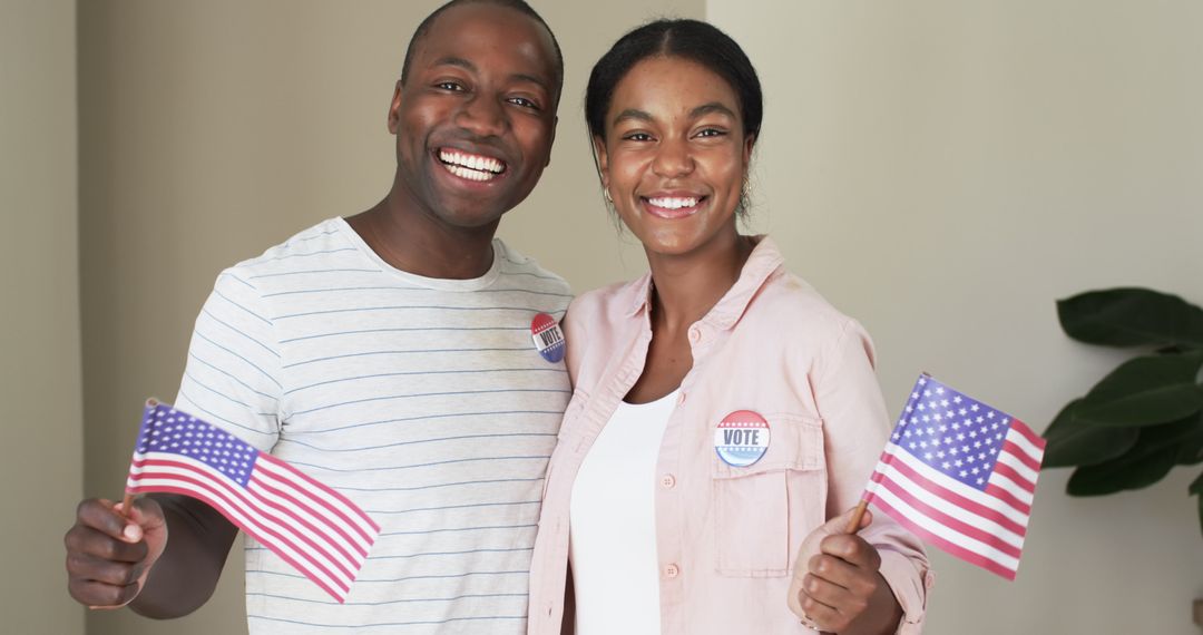Diverse Couple Celebrating Voting with American Flags