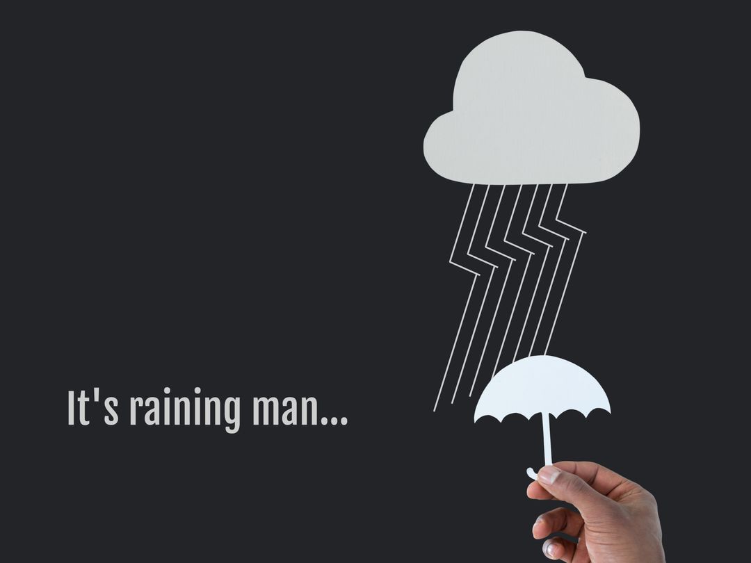 Hand Holding Umbrella Under Rain Cloud Illusion